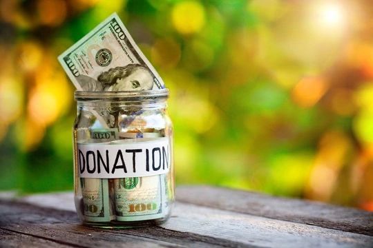 Donation jar filled with money